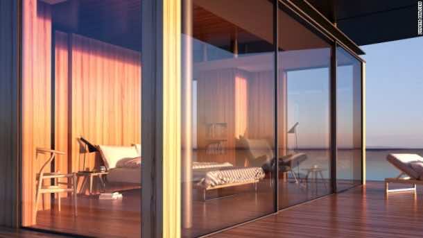 The rooms have extensive woodwork and large windows to allow in natural sunlight