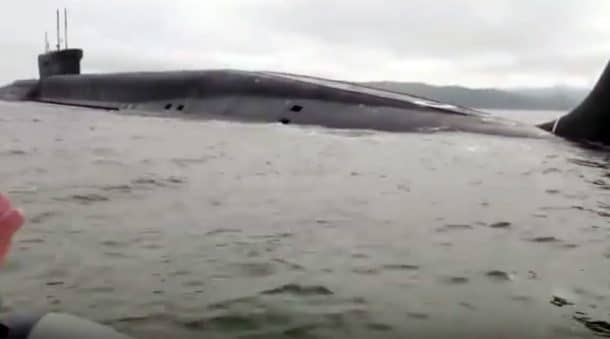 a-russian-submarine-surfaced-beside-a-fishermen_image-0